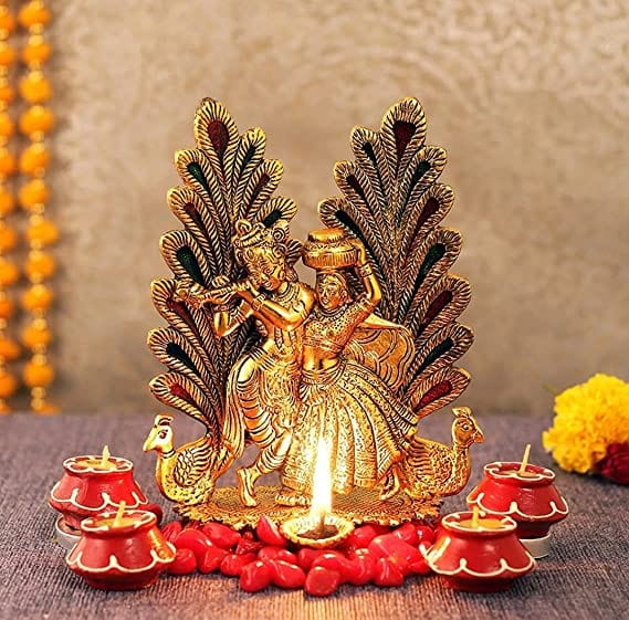 Naturals Export Radha Krishna Idol with Mutki Diyas and Pebbles